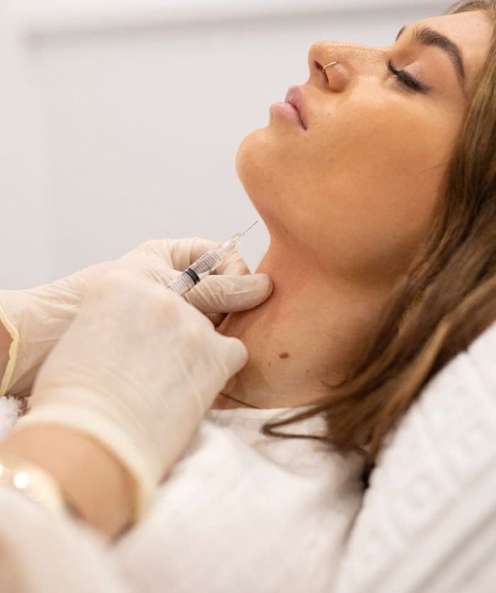 How Do Cosmetic Injections Enhance Chin Contouring?
